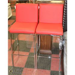 PAIR OF RED LEATHERETTE AND CHROME BAR STOOLS