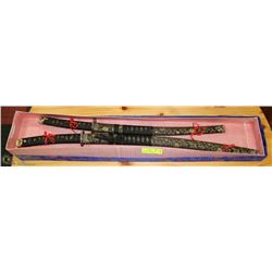 SET OF BRASS TIPPED KATANA SWORDS IN DISPLAY BOX