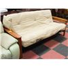 Image 1 : BEIGE MICROFIBER AND SOLID WOOD FUTON