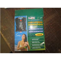 WORLD Famous 5 gal. Camp shower, heats from sun, returned