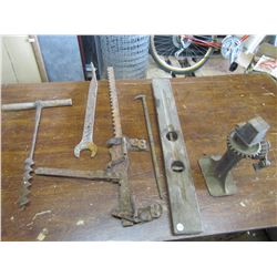 LOT of vintage tools - car jack, fence tightner, auger bit, level, etc.