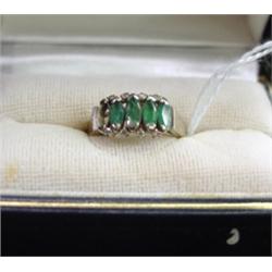 Four Emerald Ring with Tiny Diamonds.