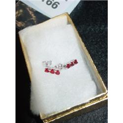 Two Pairs of Earrings: Tiny Diamonds and Ruby Tone.