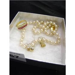 Three Faux Necklances: One is Monet.