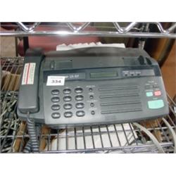 Two Fax Machines, Canon and Sharp.