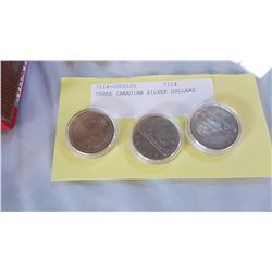 THREE CANADIAN SILVER DOLLARS