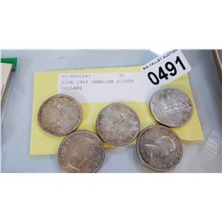 FIVE 1963 CANADIAN SILVER DOLLARS