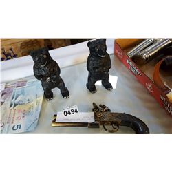 2 CAST IRON BEAR PIGGY BANKS AND PISTOL