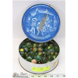 TIN FULL OF MARBLES