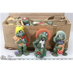 CASE OF CERAMIC FROGS.