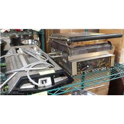 SHELF CONTAINING STAR GRILL PRESS, GENUS FLY