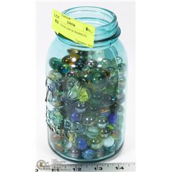 BLUE MASON JAR OF MARBLES.