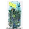 Image 1 : BLUE MASON JAR OF MARBLES.