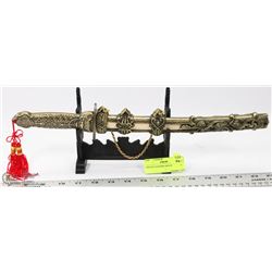 ORNATE DAGGER AND SCABBARD.