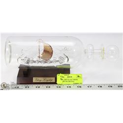 HAND BLOWN GLASS "VIKING LONGSHIP" IN A BOTTLE.