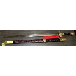 ORNATE SWORD GOLD COLOR TRIMMING GREEN STONE