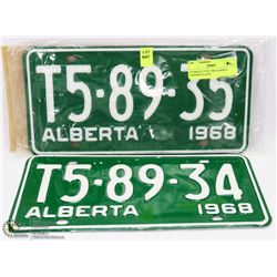 2 CONSECUTIVE 1968 ALBERTA LICENSE PLATES.