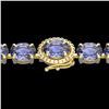 Image 1 : 19.25 CTW Tanzanite & VS/SI Diamond Eternity Micro Halo Bracelet 14K Yellow Gold - REF-180F2N - 4024
