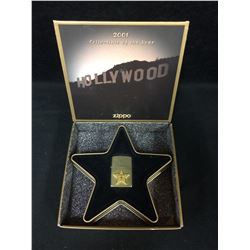 2001 COLLECTIBLE OF THE YEAR HOLLYWOOD'S LEADING LIGHT ZIPPO LIGHTER W/ BOX
