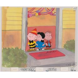 Charlie Brown, Lucy, and Linus production cels from a Peanuts cartoon