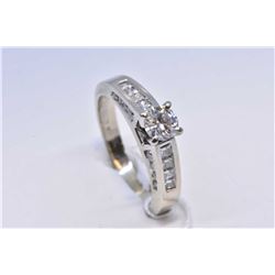 Ladies 14kt white gold and diamond wedding set including engagement ring set with 0.70cts of brillia