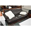 Image 1 : Semi contemporary button tufted full sized sofa with decorative show wood plus two decorative pillow