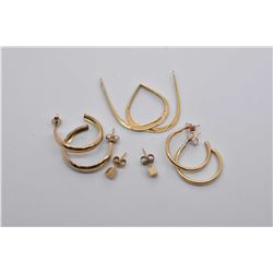 Three pairs of gold earrings and a pair of gold earring extenders