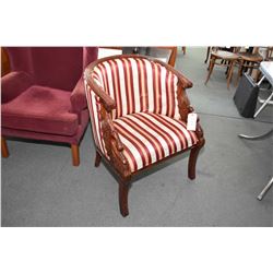 Reproduction mahogany swan head decorated parlour chair with Regency striped upholstery