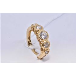 Ladies 14kt yellow gold ring set with cubic zirconia diamond like stones