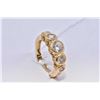 Image 1 : Ladies 14kt yellow gold ring set with cubic zirconia diamond like stones