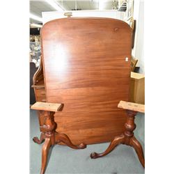 Antique double pedestal mahogany dining table with carved ball and claw feet