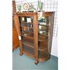 Image 1 : Antique quarter cut oak Empire style curved glass china cabinet with three shelves and partial mirro