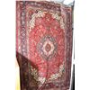 Image 1 : 100% Iranian wool Tabriz carpet with center medallion, red background, highlights in gold, blue, gre