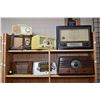 Image 1 : Two shelf lots of table top radios including Crosley, RCA Victor, Spartan etc.