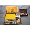 Image 1 : Selection of 1:12th scale dollhouse miniatures including tools and books on dollhouse and furniture 