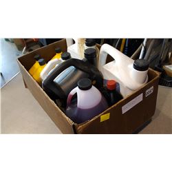 BOX OF TRANSMISSION FLUID AND CHAINSAW FLUID AND OIL