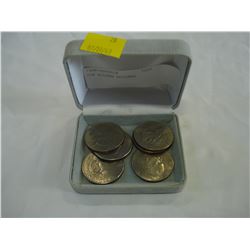 SIX SILVER DOLLARS