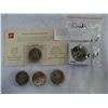 Image 1 : FOUR CANADIAN SOUVENIR COINS AND PACKAGE OF FOUR COINS