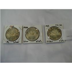 THREE CANADIAN SILVER DOLLARS