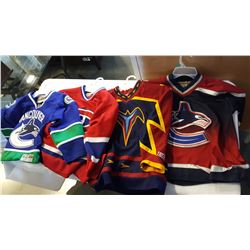 FOUR YOUTH HOCKEY JERSEYS CANUCKS AND OTHER