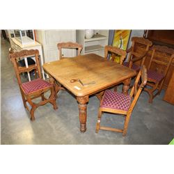 OAK CRANK DINING TABLE W/ CARVED LEGS AND 6 CHAIRS