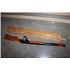 Image 2 : VINTAGE RED RYDER GUN AND 4 YARDSTICKS