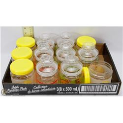 FLAT OF SMALL LIDDED JARS