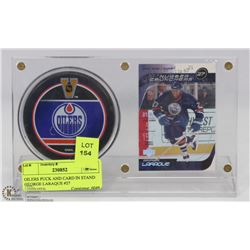 OILERS PUCK AND CARD IN STAND GEORGE LARAQUE #27