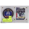 OILERS PUCK AND CARD IN STAND GEORGE LARAQUE #27