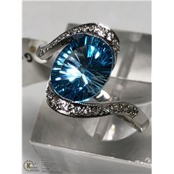 43) 14KT W. GOLD BLUE TOPAZ & CUBIC ZIRCONIA RING