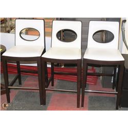 GROUP OF 3 WHITE LEATHERETTE AND WOOD BAR STOOLS