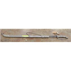 HORSE HEAD HANDLED SABER IN METAL SCABBARD