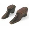 Image 1 : A 19th century shoe shaped wooden snuff box, decorated with brass inlay and another similar box,...