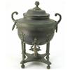 Image 1 : A Regency copper urn, with Egyptian decorated ovoid body on caryatid supports with sphinx on plat...